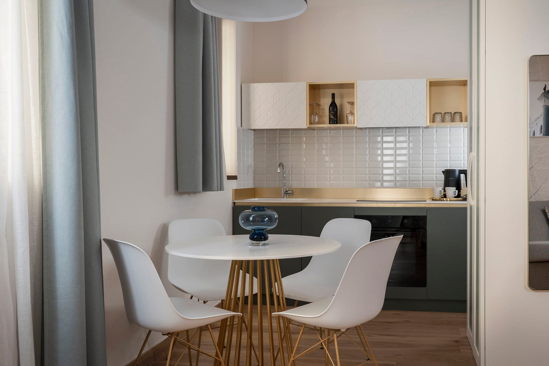 Open-plan fully equipped kitchen with dining table, Classic Apartment with canal view