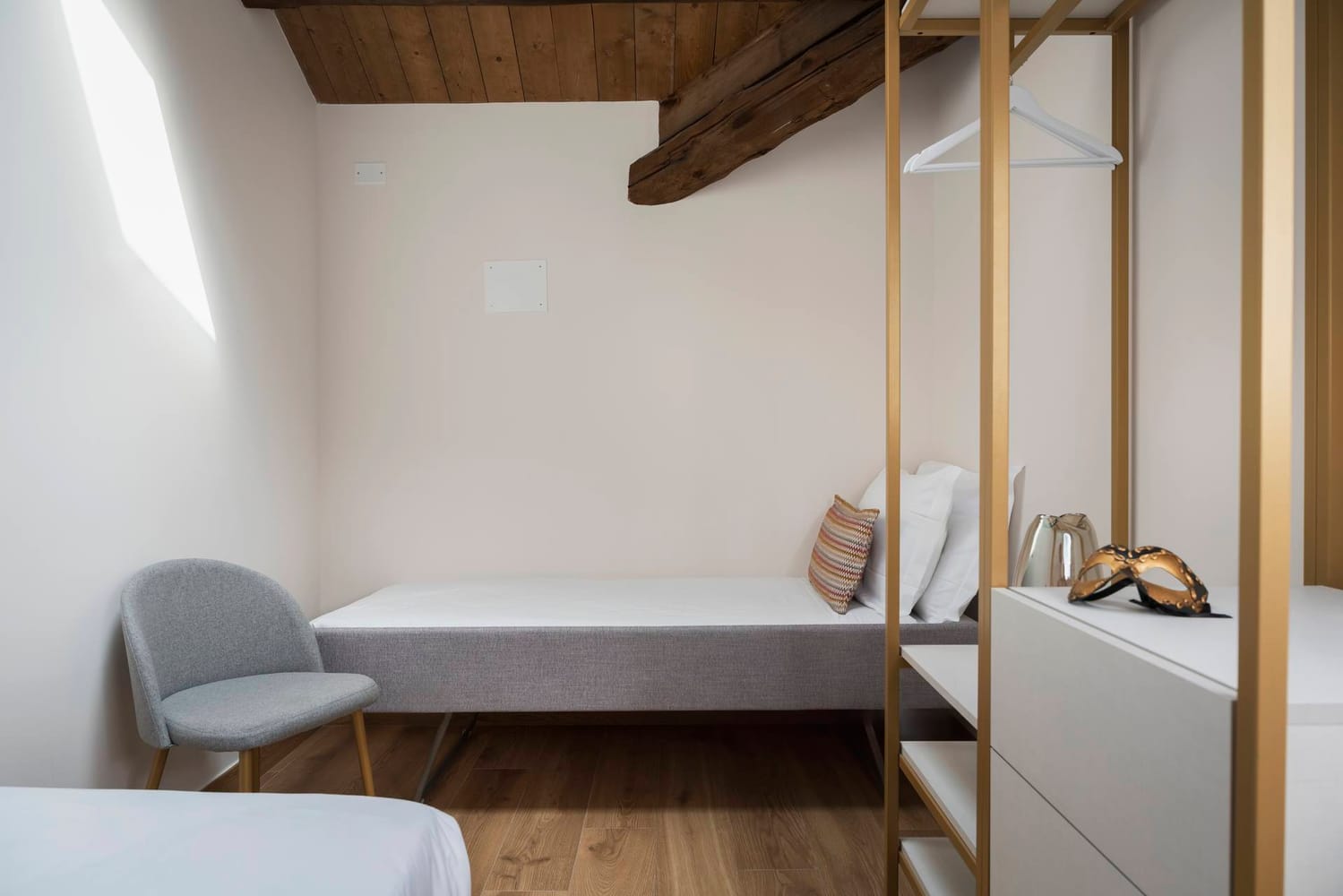 Detail of the second bedroom with extra bed in the Classic Apartment, Palazzo dei Guardiani, Venice