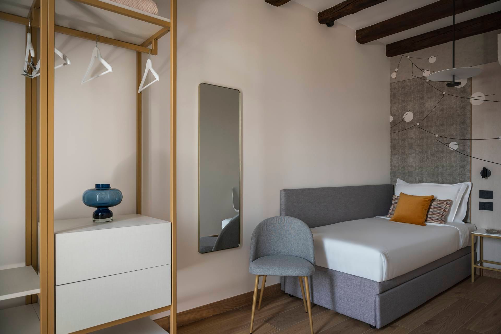 Detail of second bedroom with extra bed and wardrobe, Superior Apartment with Canal View