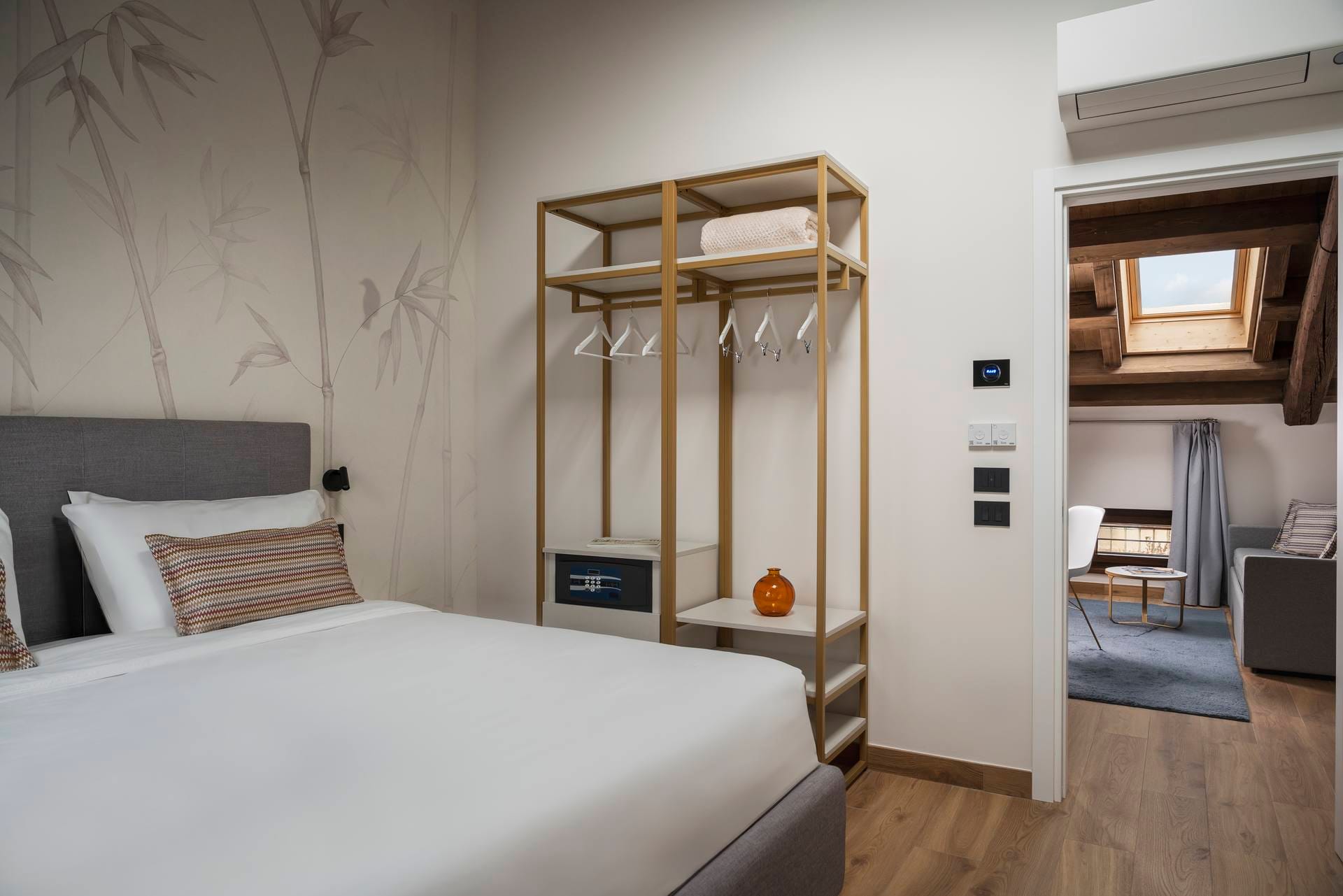 Bedroom with double bed and wardrobe in the Classic Apartment