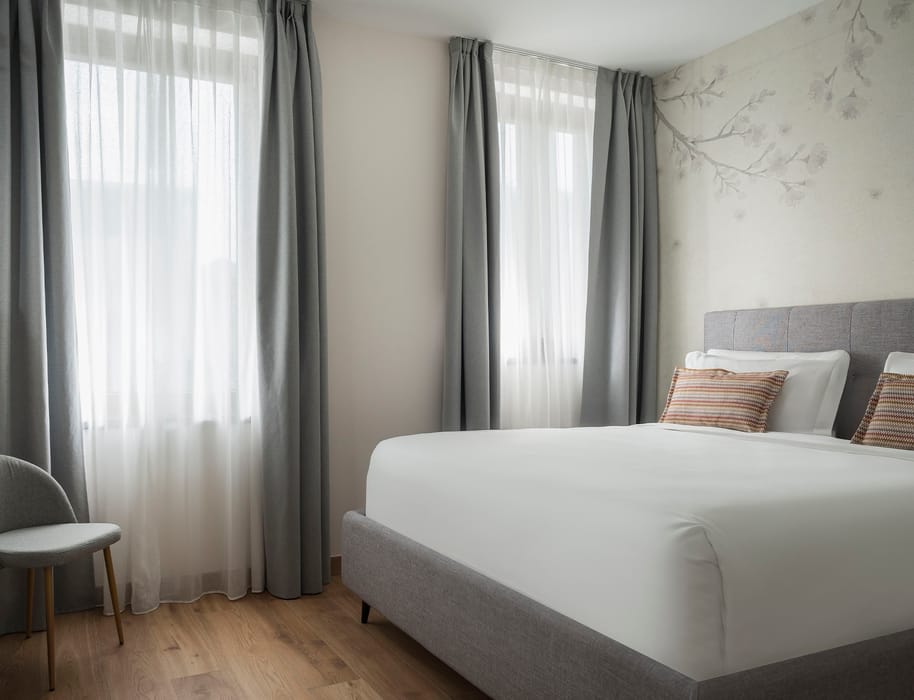 Detail of the windowed double bedroom in the Standard Apartment, Palazzo dei Guardiani, Venice